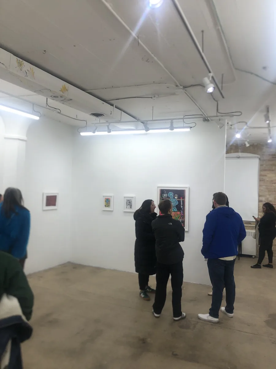 Visitors at the King for a Day exhibition in Portrait Society Gallery